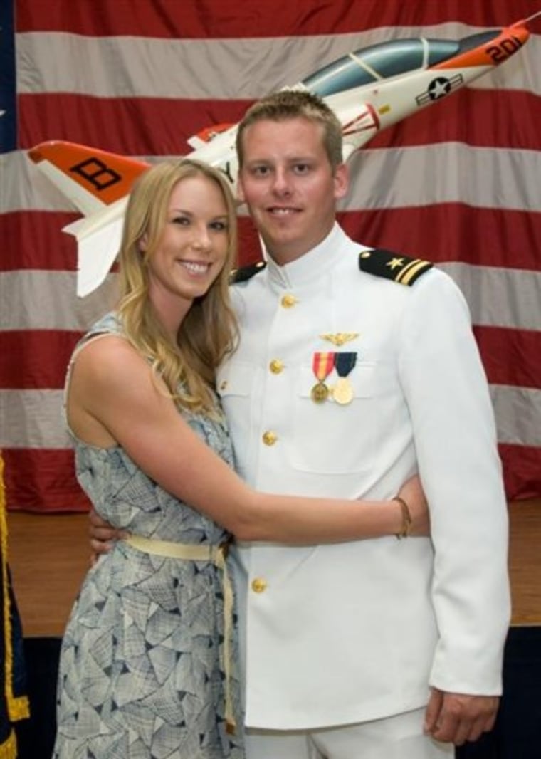 This 2011 photo provided by the Reis family shows Karen Reis, left, and her brother David Reis at his winging ceremony for the Navy. The Reis siblings were among the four people found dead in a New Year's Day shooting at a condominium in Coronado, Calif., a toney neighborhood on San Diego Bay.